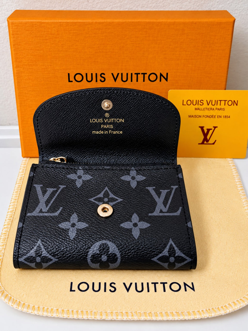 Louis Vuitton Black Monogram Snap Wallet – Compact & Stylishroduct