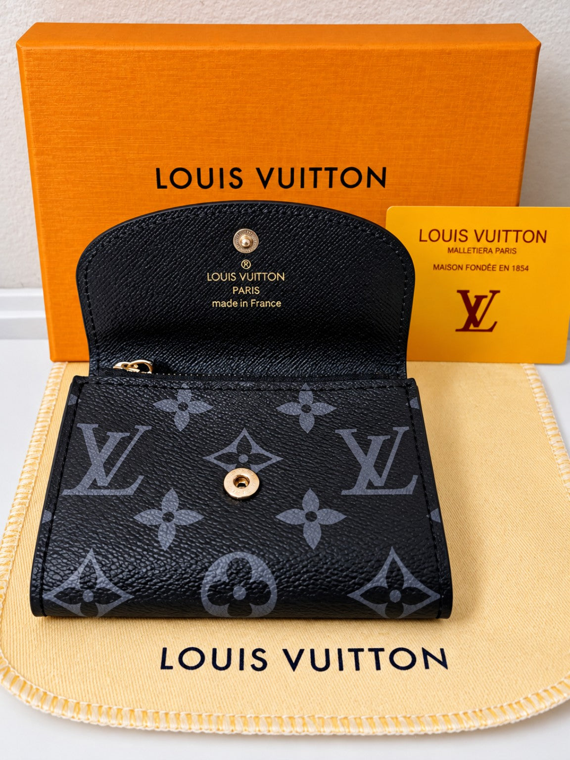 Louis Vuitton Black Monogram Snap Wallet – Compact & Stylishroduct