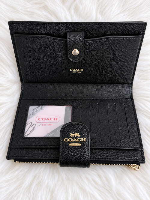 Coach Black Embossed Zip Wallet – Elegant & Stylish