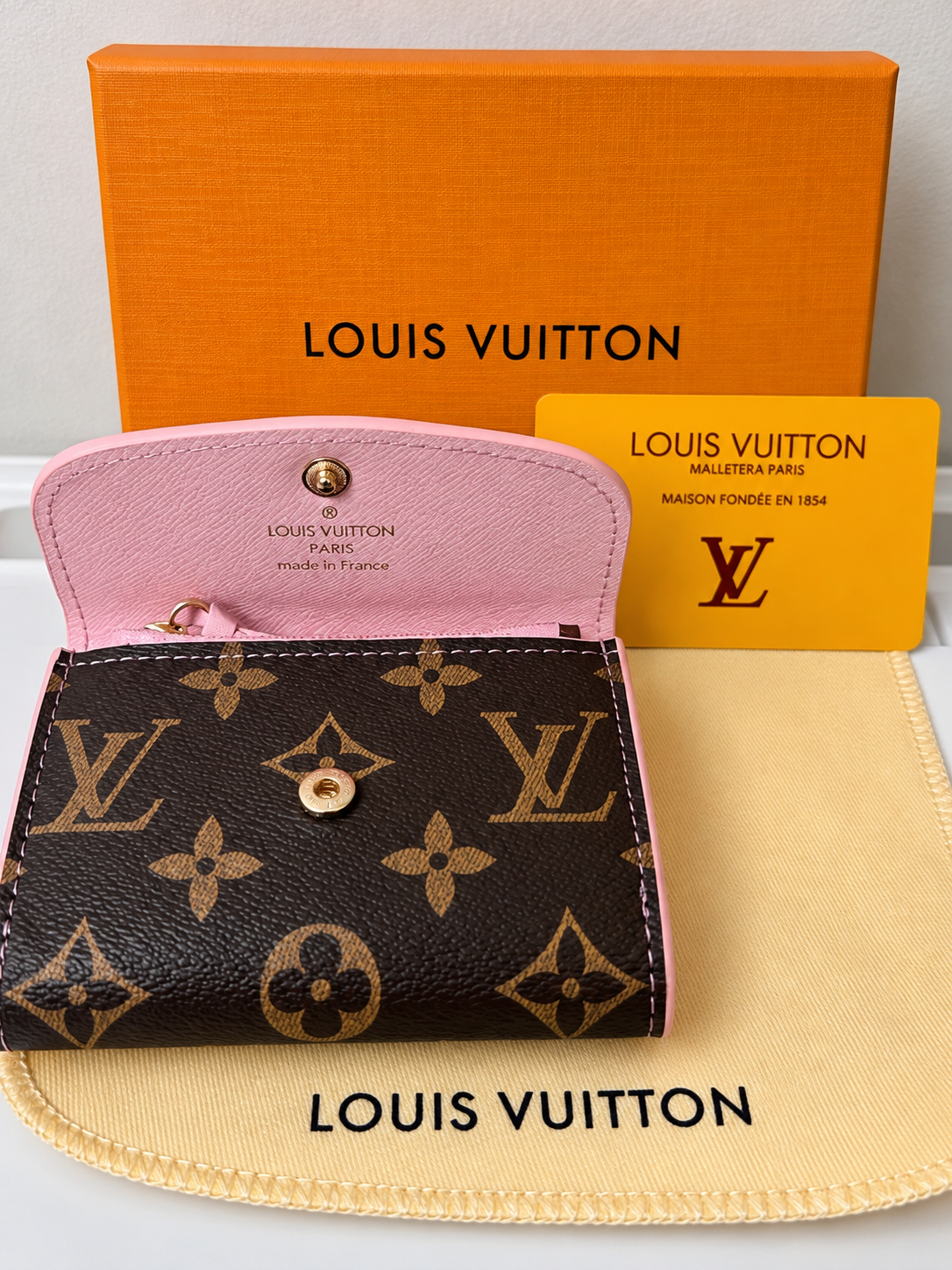Louis Vuitton Brown Monogram Wallet with Pink Interior – Compact